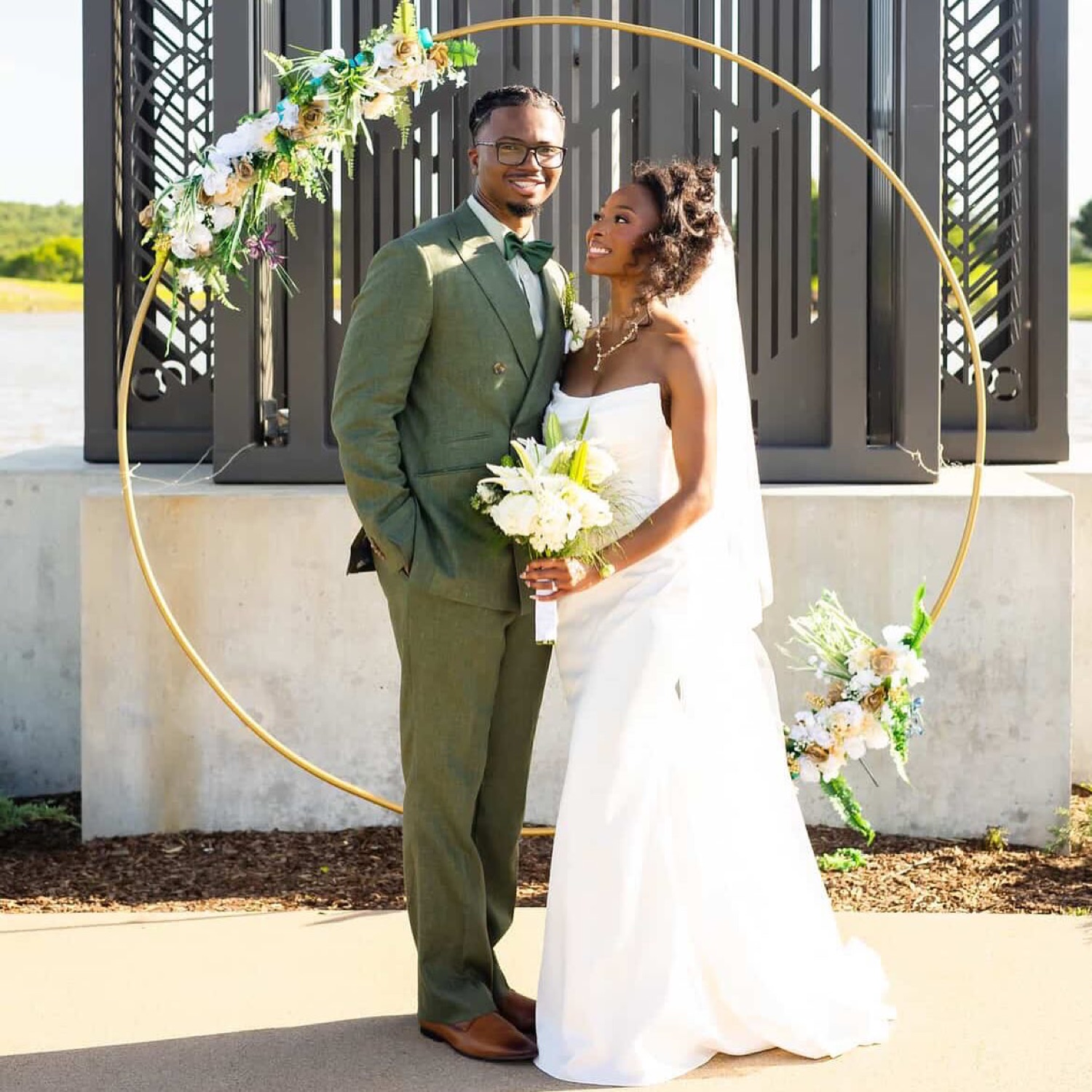 Wedding couple with bouquet by Sie & Mo Bouquet Co.
